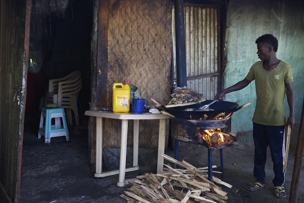 Freshly caught Talapia being fried for breakfast on the shores of Lake Hawassa, Ethiopia