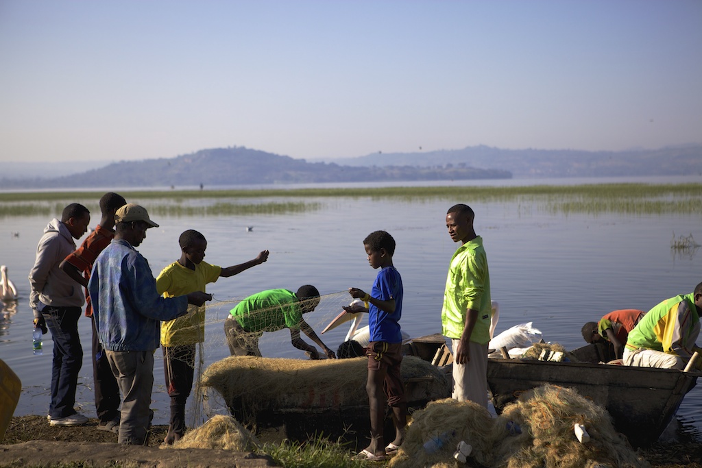 Children mending nets by the side of Lake Hawassa