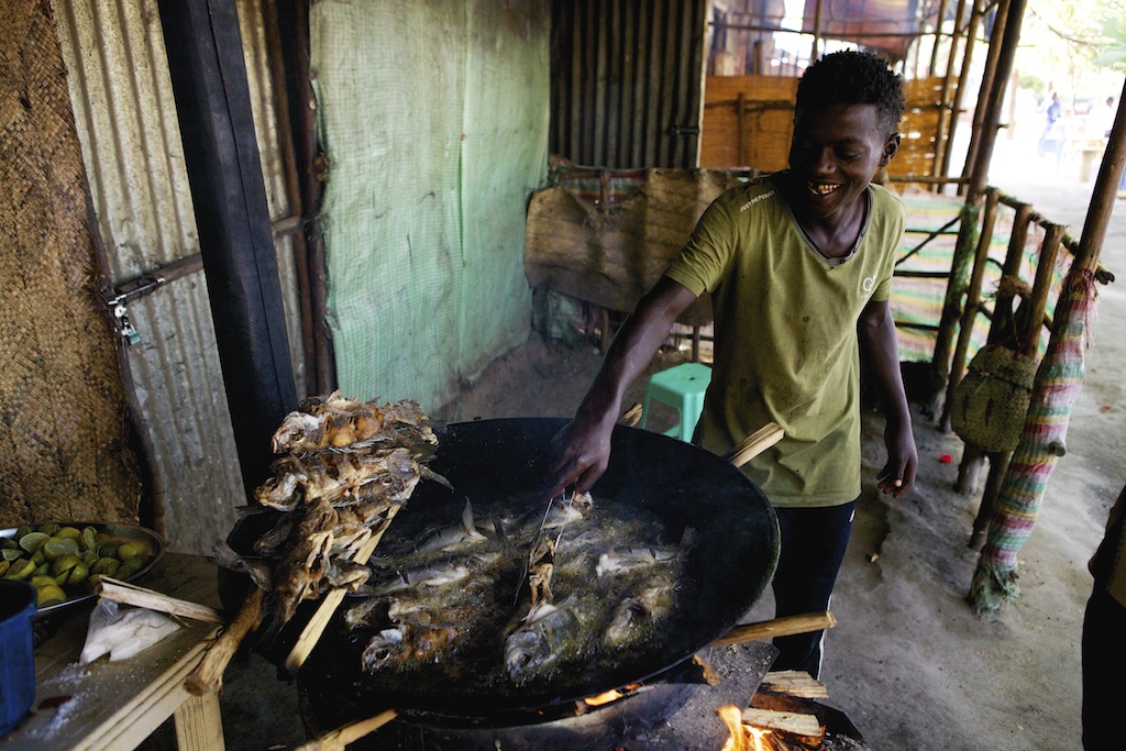 Freshly caught Talapia being fried for breakfast on the shores of Lake Hawassa, Ethiopia
