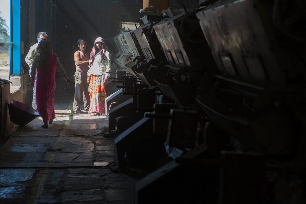 Cotton being ginned at a ginners in Madhya Pradesh, India.